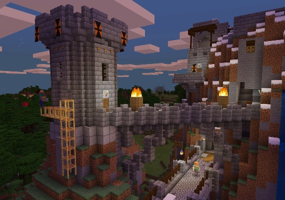 A stone fortress and fortified bridge along a cliffside.
