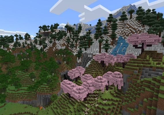 A natural Minecraft landscape featuring a mountain slope filled with pink cherry trees.